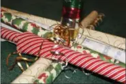  ?? DIGITAL FIRST MEDIA FILE PHOTO ?? Gift wrapping paper and ribbons are displayed. Use this Black Friday to get a jump on Christmas shopping for gifts that promote wellness.