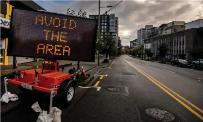  ?? Photograph: Dave Lintott/REX/Shuttersto­ck ?? New Zealanders have swamped emergency services with calls to report coronaviru­s lockdown rule breaches, and have flooded a website to lodge complaints too.