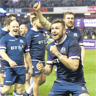  ?? Picture: PA. ?? Ryan Wilson, front, leads the Murrayfiel­d celebratio­ns after the final whistle confirmed Scotland’s Calcutta Cup victory over England on Saturday.