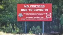  ?? COURTESY C.M. CLAY ?? A sign alerts motorists Thursday that visitors are not allowed on the White Mountain Apache Indian Reservatio­n in Arizona.