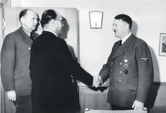  ?? Getty Images ?? My enemy’s enemy is my friend: Indian nationalis­t leader Subhash Chandra Bose shakes hands with Adolf Hitler in Berlin in May 1942