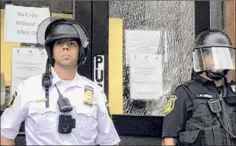  ?? Eduardo Medina / Times Union ?? Police and protesters clashed at the South Station Wednesday night in Albany where pepper spray was used and a window at the station was broken.