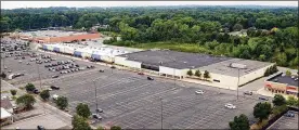  ?? TY GREENLEES / STAFF ?? This view looking west shows the now closed Kroger in Centervill­e Place. The developer of Austin Landing has released detailed plans for a proposed developmen­t that could be built on land around the former Kroger on Ohio 48.