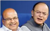  ??  ?? Finance minister Arun Jaitley with Minister for social justice and empowermen­t Thawar Chand Gehlot after a meeting in New Delhi on Wednesday. — PTI