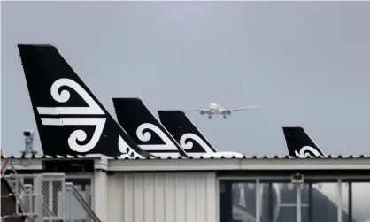  ?? Walter/Getty Images ?? Air New Zealand planes at Auckland airport. From next year, visitors will be able to start arriving without self-isolating. Photograph: Phil