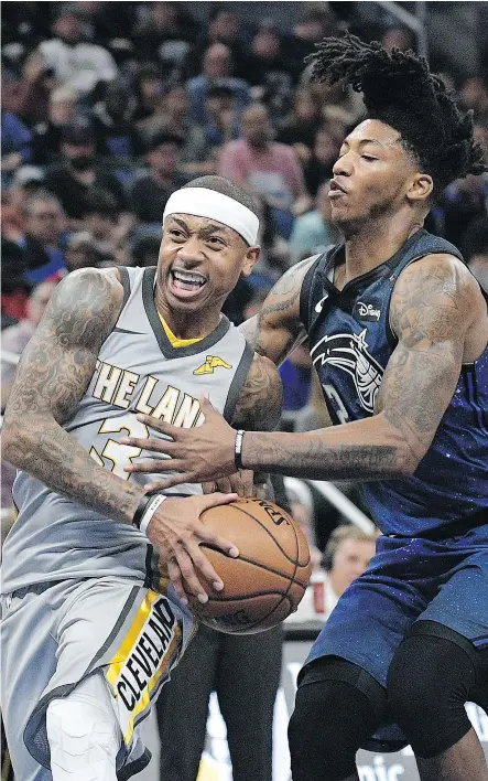  ?? — AP FILES ?? Isaiah Thomas, left, formerly of the Cleveland Cavaliers, and Elfrid Payton, a now-former member of the Orlando Magic, were among the players moved before Thursday’s NBA trade deadline.