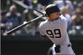  ?? NICK WASS — THE ASSOCIATED PRESS ?? The New York Yankees' Aaron Judge breaks his bat on a single during the seventh inning Sunday against the Baltimore Orioles in Baltimore.