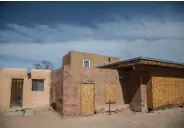  ??  ?? One of the homes in Owe’neh Bupingeh, the pueblo’s historic center, that is awaiting restoratio­n. So far, about 35 homes have been overhauled, and the pueblo hopes to revamp another 20 in the project’s next phase.