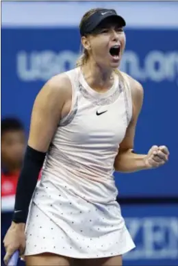 ?? ADAM HUNGER — THE ASSOCIATED PRESS ?? Maria Sharapova reacts after winning a Wednesday in New York. point against Timea Babos