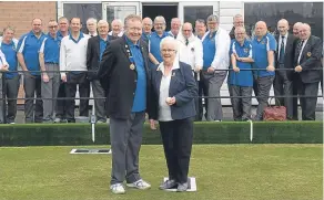  ??  ?? Perth’s Caledonian Bowling Club got their season under way when Lily Duncan threw the first jack. President Alec Dick looks on.