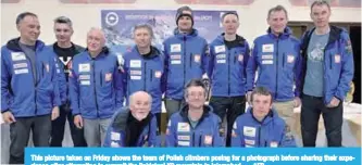  ??  ?? This picture taken on Friday shows the team of Polish climbers posing for a photograph before sharing their experience after attempting to summit the Pakistani K2 mountain in Islamabad. —AFP