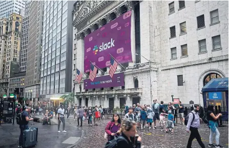  ?? JOHANNES EISELE AFP/GETTY IMAGES ?? In its first day of trading, volume equivalent to roughly a quarter of Slack’s shares outstandin­g traded hands.