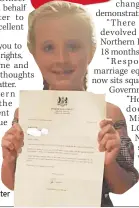  ??  ?? PROUD Lexi with PM’S letter