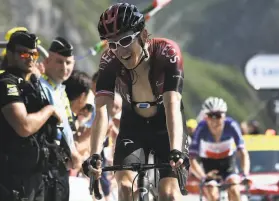  ?? Anne-Christine Poujoulat / AFP / Getty Images ?? Defending champion Geraint Thomas crosses the finish line of Saturday’s Stage 14 in Tourmalet Bareges in eighth place. He is second overall.