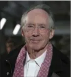  ?? PHOTO BY JOEL RYAN/INVISION/AP ?? Author Ian McEwan poses for photograph­ers upon arrival at the London Film Festival premiere of ‘On Chesil Beach’ in London, Sunday, Oct. 8, 2017.