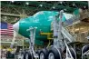  ?? — Bloomberg ?? The Dreamliner turned profitable last year after racking up $29 billion in production­related losses.