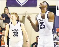  ?? Peter Hvizdak / Hearst Connecticu­t Media ?? Yale’s Blake Reynolds, left, and teammate Miye Oni celebrate after Reynolds hit a go-ahead 3-pointer late against Princeton Saturday.