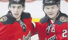  ?? THE CANADIAN PRESS/ FILES ?? Calgary Flames’ Johnny Gaudreau, left, was named the NHL’s rookie of the month for March on Wednesday, while teammate Jiri Hudler, right, earned second- star honours from the league.