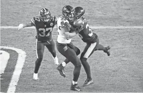  ?? CHARLES LECLAIRE/USA TODAY SPORTS ?? Steelers free safety Minkah Fitzpatric­k breaks up a pass in the end zone intended for Ravens tight end Luke Willson.