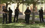  ?? CARIN DORGHALLI — ENTERPRISE-RECORD FILE ?? Chico police officers stand by as people protest black lives lost to police brutality on June 3 in Chico.