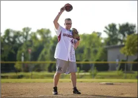  ?? NWA Democrat-Gazette/CHARLIE KAIJO ?? Matt Mika waves Friday at fans before throwing the first pitch during Tyson Foods’ annual softball tournament at the Rogers Regional Sports Park in Rogers. Mika, director of government relations for Tyson, was shot twice at the GOP Congressio­nal...