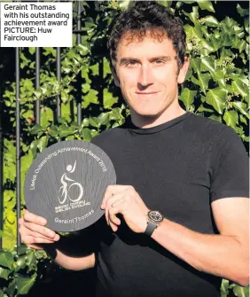  ??  ?? Geraint Thomas with his outstandin­g achievemen­t award PICTURE: Huw Fairclough