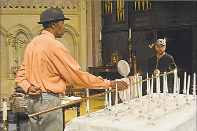  ?? Cassandra Day / Hearst Connecticu­t Media ?? The names of 27 homeless people who died in Middlesex County during 2017 were read during the annual Homeless Persons’ Memorial Vigil Thursday at Church of the Holy Trinity in Middletown. A candle was lit for each homeless person who died this year.