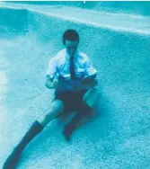  ??  ?? Ignatius Park College student Hamish Salte reads underwater.
