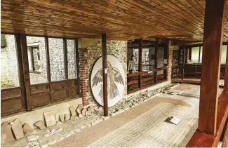  ??  ?? TOP Bignor Roman Villa in West Sussex was built around 350AD.
Its large excavated courtyard boasts extraordin­ary mosaic floors ABOVE An entrancewa­y section of the ancient tiling in Bignor