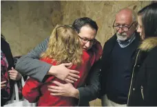  ?? Tulsa World ?? Rami Jabara, the victim’s brother, hugs assistant district attorney Julie Doss after the verdict yesterday