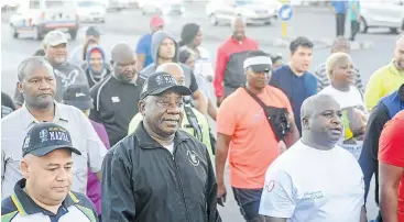  ?? Picture: Gallo Images ?? President Cyril Ramaphosa is joined by citizens during a 5km morning walk from the Gugulethu Sports Centre to Athlone Stadium. Ramaphosa led a group of about 100 people on a morning walk to promote a healthy lifestyle.