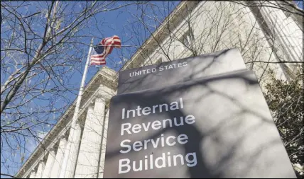  ?? SUSAN WALSH / AP FILE (2013) ?? The Internal Revenue Service and the tax-preparatio­n industry have been trying for the last several months to persuade people to adjust their W-4s to incorporat­e changes included in the 2017 tax bill. Those who haven’t adjusted their W-4s may see a lower refund than they might have expected.