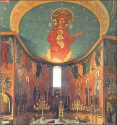  ??  ?? BLESSING: The sanctuary behind the altar in the Greek Orthodox Cathedral in Woodstock is dominated by a fresco of the Madonna and Child. Also called St George’s Cathedral, the church was built in 1904, but the frescoes were done as recently as the...