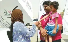  ?? Arshad Ali/Gulf News ?? Irfan Shaikh and Sana with their daughter Hayat at the Al Aweer amnesty centre in Dubai on Thursday.