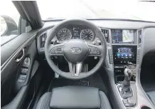  ??  ?? The interior of the 2018 Infiniti Q50 includes updated trim material.