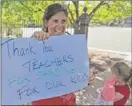  ??  ?? Kim Lutz, who has children at Alexander Graham Bell Elementary, backs teachers. | AL PODGORSKI~SUN-TIMES