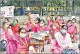  ?? PTI ?? ASHA workers, mid-day meal workers and Anganwadi workers n protest against the state government in Bengaluru.