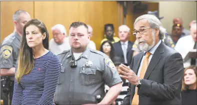  ?? Tyler Sizemore / Hearst Connecticu­t Media ?? Attorney Andrew Bowman, right, speaks during the arraignmen­t of his client Michelle C. Troconis, left, on charges of tampering with or fabricatin­g physical evidence and first-degree hindering prosecutio­n at state Superior Court in Norwalk on Monday. Troconis and Fotis Dulos were arrested at an Avon hotel late Saturday night and held on a $500,000 bond for the charges. Fotis Dulos is the estranged husband of Jennifer Dulos, the 50-year-old mother of five who has been missing since May 24.