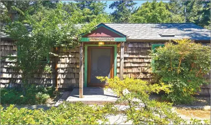  ??  ?? The single-level “Ivy Cottage,” located at 18571 Montevina Road sits on about a half acre of scenic and level land in a rural setting complete with a trickling pond, mature trees and foliage. The two-bedroom and one-bath cottage has about 928 square...