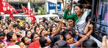  ?? Agence France-presse ?? ↑ Security forces detain an activist for protesting against the CAA in Guwahati, Assam, on Friday.