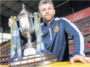  ??  ?? SILVER LINING Robinson is thrilled Well have bounced back to reach Scottish Cup semis