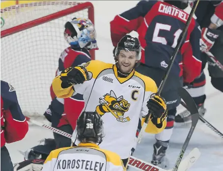  ?? KRYK
JASON ?? Sarnia Sting captain Sam Studnicka celebrates after scoring a first-period goal against the Windsor Spitfires Thursday at the WFCU Centre.