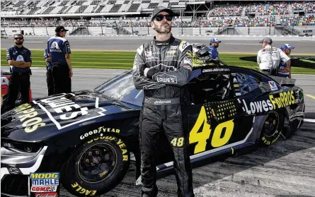  ?? TERRY RENNA / ASSOCIATED PRESS ?? Jimmie Johnson looks up at the leaderboar­d during qualifying for the Daytona 500 at Daytona Internatio­nal Speedway on Sunday. Johnson finished 10th in the standings last season and was never really a serious contender for the championsh­ip.