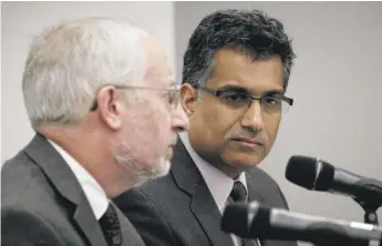  ?? ERIC FRANCIS/ GETTY IMAGES FILE ?? Dr. Ali Khan ( right) says, “It shouldn’t be anybody who needs a test can get a test. It should be anybody who has a positive test immediatel­y gets isolated.”