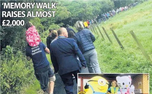  ??  ?? The Pwllheli ‘Memory Walk” organised by Donna Jones, right