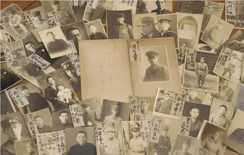  ?? ?? Photos of soldiers that were left at Shinjoji temple in Kanazawa during World War II