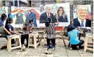  ??  ?? Students paint murals of US President Donald Trump and first lady Melania Trump on canvas sheets along a street in Mumbai, India, February 21, 2020. (Reuters/Francis Mascarenha­s)