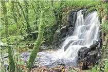  ??  ?? Glenashdal­e Falls on Arran