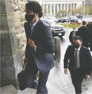  ?? ADRIAN WYLD / THE CANADIAN PRESS ?? Prime Minister Justin Trudeau arrives at the West Block of the House of Commons
Monday prior to the release of his government’s first budget in two years.