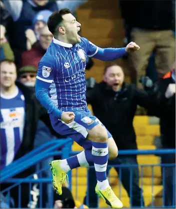  ??  ?? OH YES! Ross Wallace celebrates his long-range opener